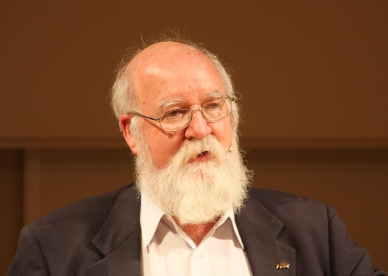 Daniel Dennett seated and speaking, photographed in October 2008